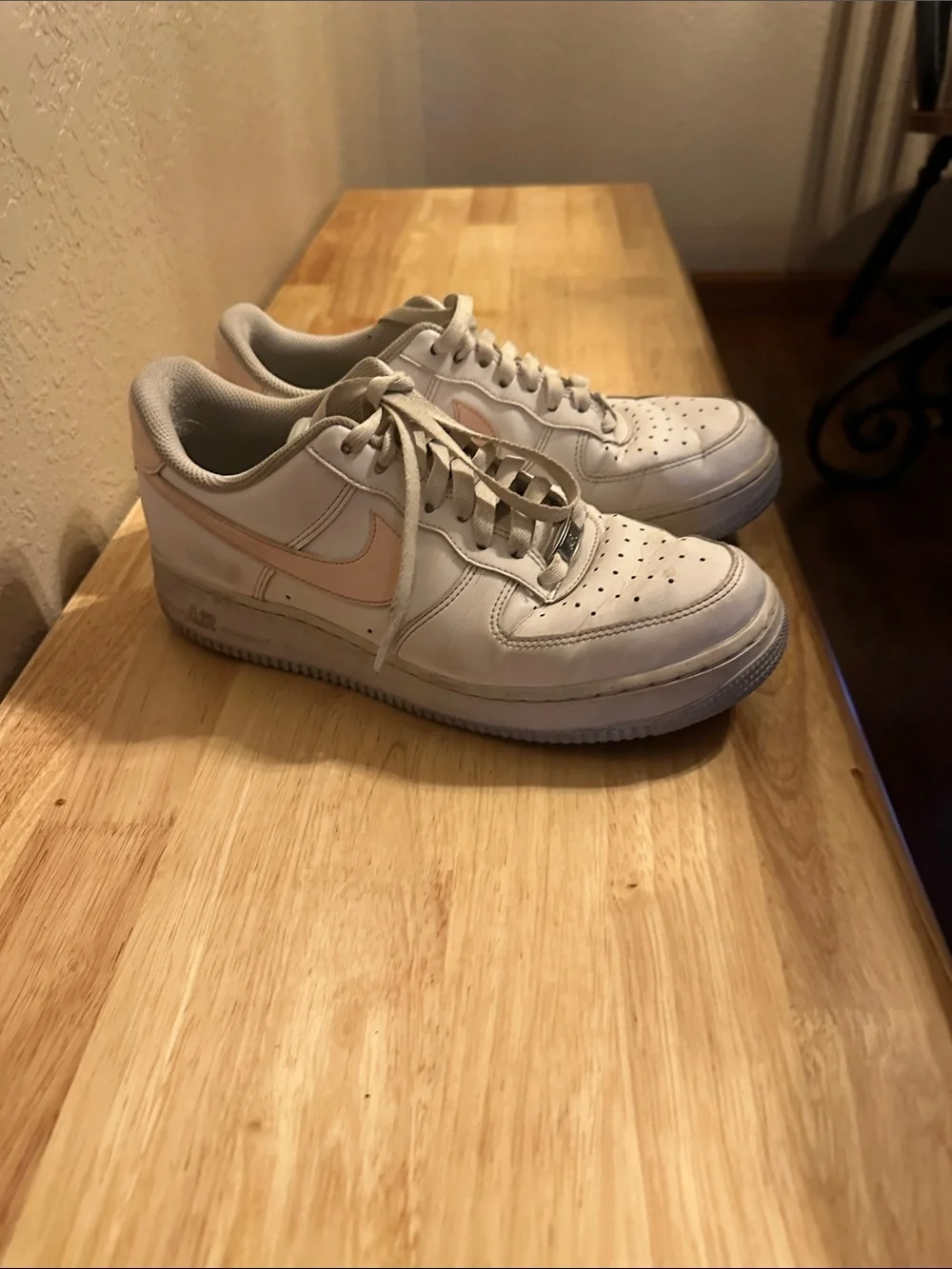 Nike White Low-Top Sneakers with Light Pink Swoosh